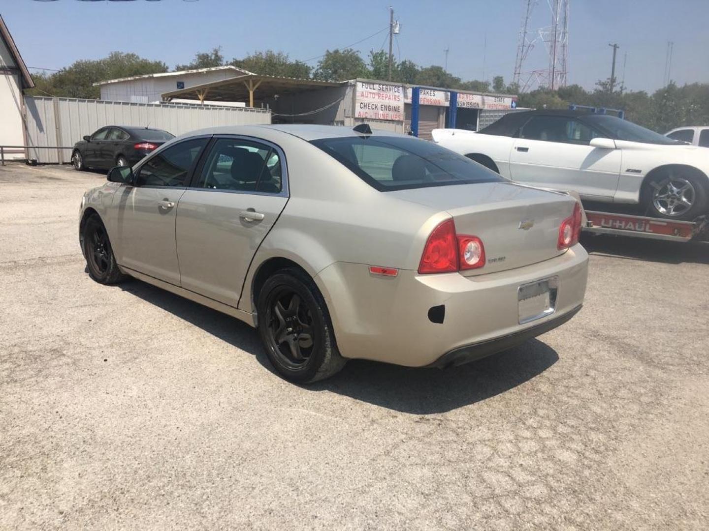 2012 GOLD CHEVROLET MALIBU LS (1G1ZB5E04CF) with an 2.4L engine, Automatic transmission, located at 1507 S Hwy 67, Cedar Hill, TX, 75104, (972) 293-1833, 32.556370, -96.973297 - Photo#2