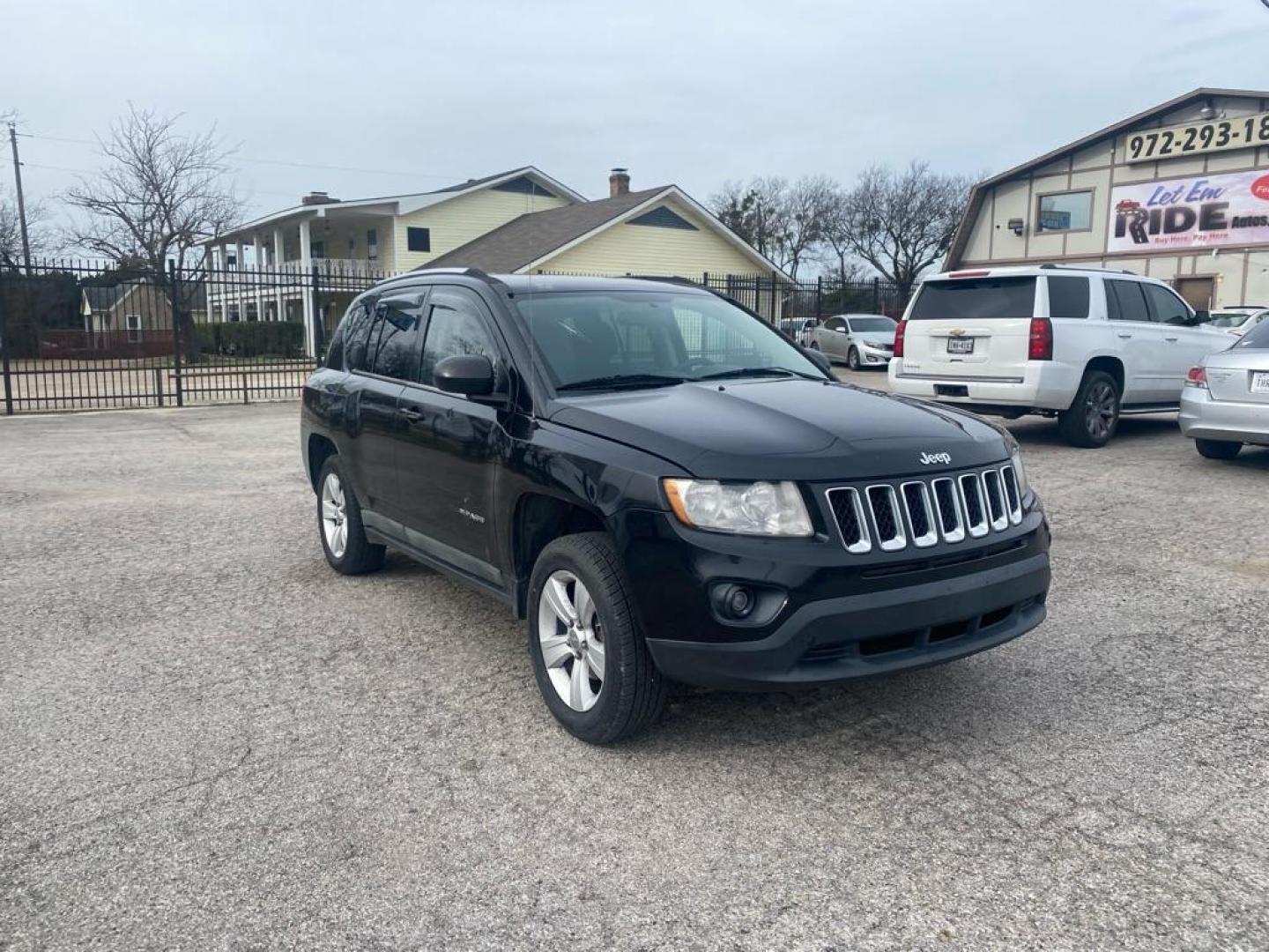 2011 BLACK JEEP COMPASS SPORT (1J4NT1FB4BD) with an 2.4L engine, Continuously Variable transmission, located at 1507 S Hwy 67, Cedar Hill, TX, 75104, (972) 293-1833, 32.556370, -96.973297 - Photo#1