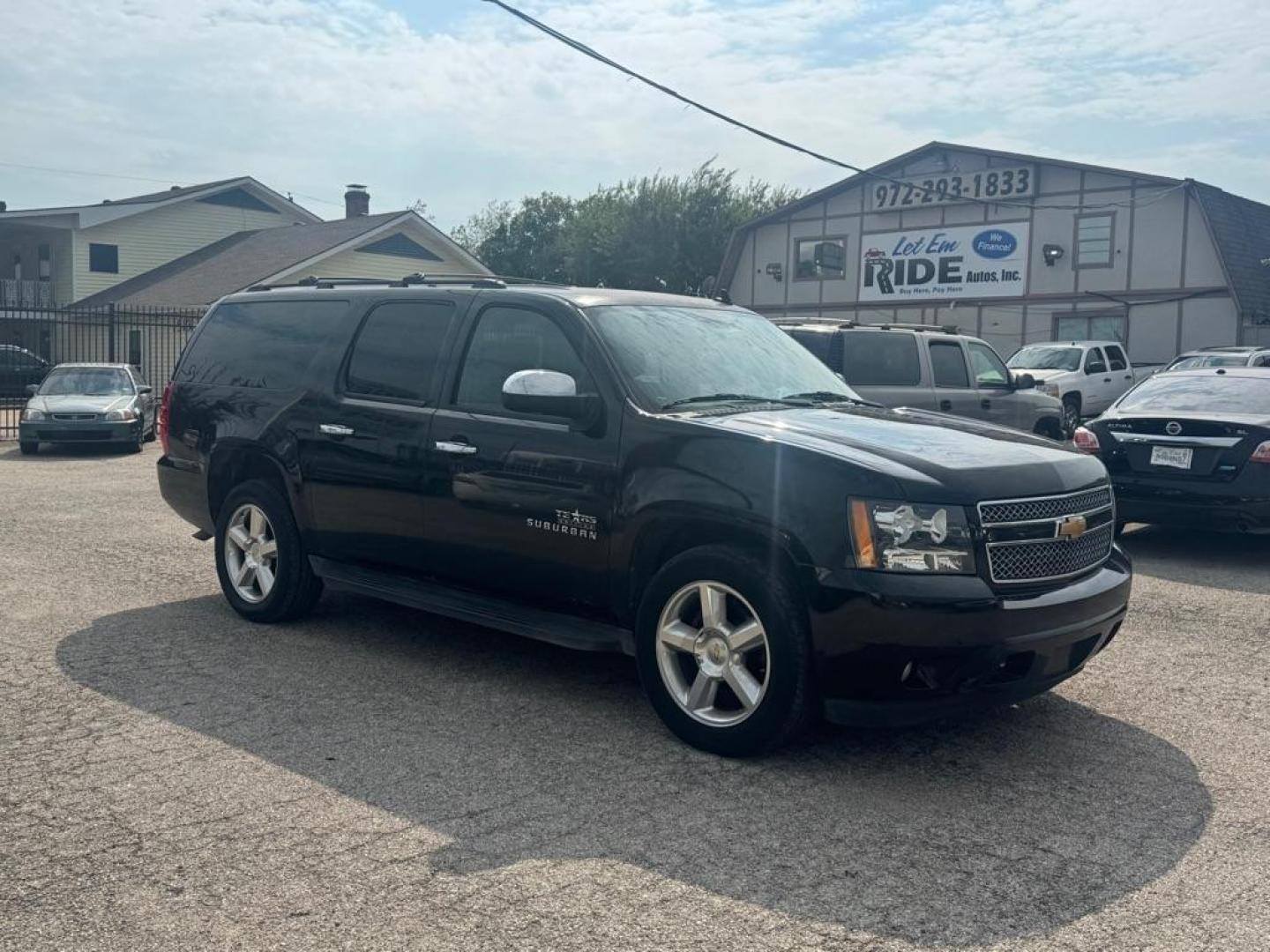 2012 BLACK CHEVROLET SUBURBAN 1500 LS (1GNSCHE05CR) with an 5.3L engine, Automatic transmission, located at 1507 S Hwy 67, Cedar Hill, TX, 75104, (972) 293-1833, 32.556370, -96.973297 - Photo#1