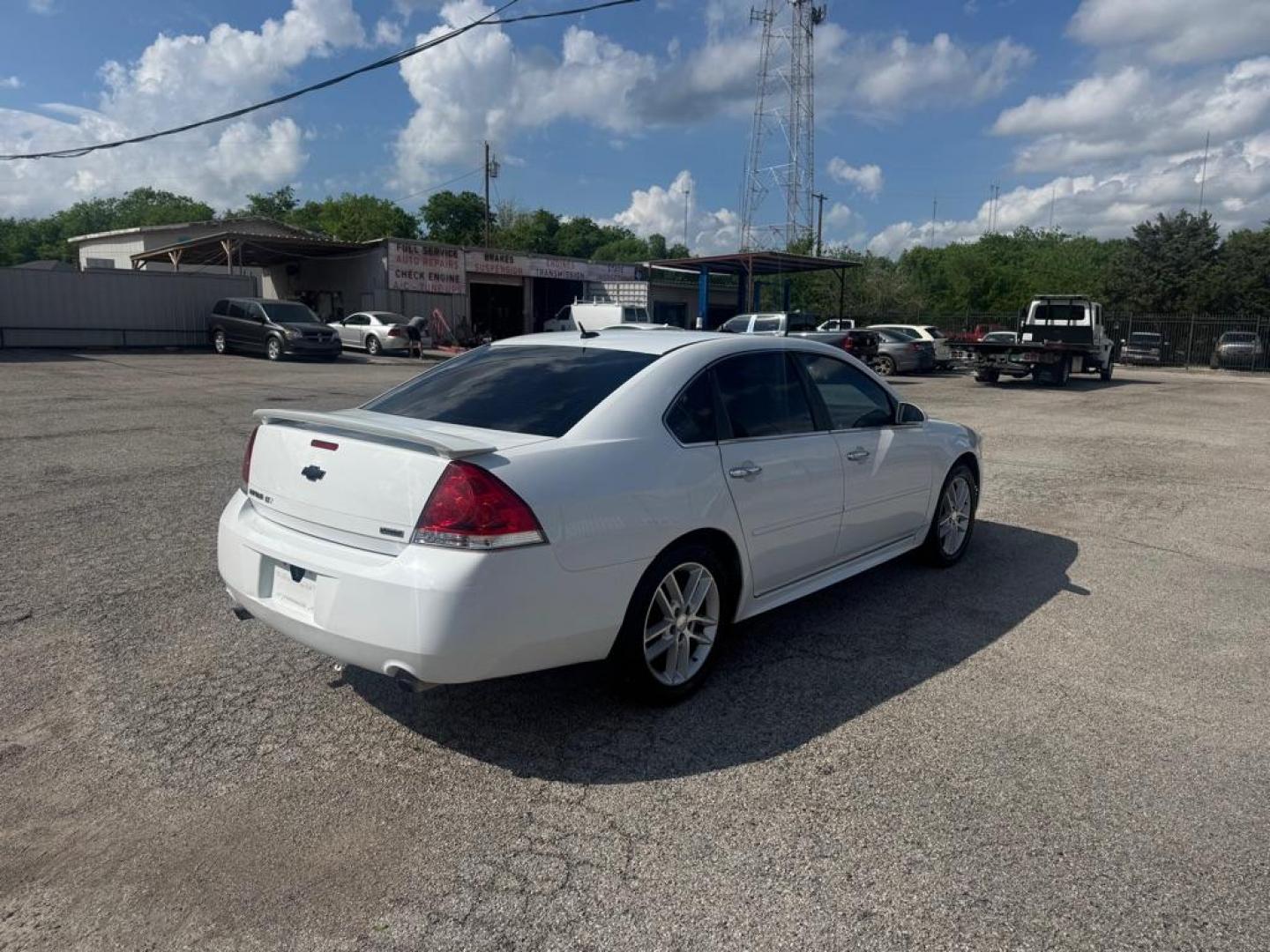 2012 WHITE CHEVROLET IMPALA LTZ (2G1WC5E32C1) with an 3.6L engine, Automatic transmission, located at 1507 S Hwy 67, Cedar Hill, TX, 75104, (972) 293-1833, 32.556370, -96.973297 - Photo#2