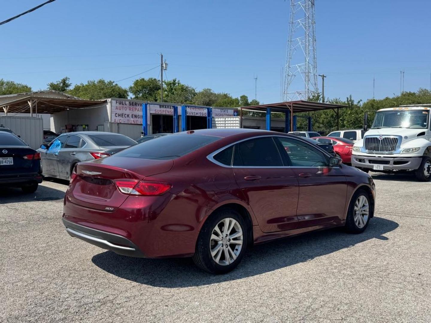 2015 MAROON CHRYSLER 200 LIMITED (1C3CCCAB4FN) with an 2.4L engine, Automatic transmission, located at 1507 S Hwy 67, Cedar Hill, TX, 75104, (972) 293-1833, 32.556370, -96.973297 - Photo#2