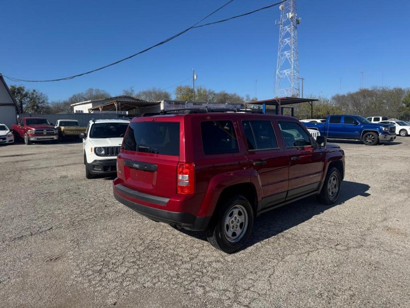 2014 RED JEEP PATRIOT SPORT (1C4NJRBBXED) with an 2.4L engine, Continuously Variable transmission, located at 1507 S Hwy 67, Cedar Hill, TX, 75104, (972) 293-1833, 32.556370, -96.973297 - Photo#2
