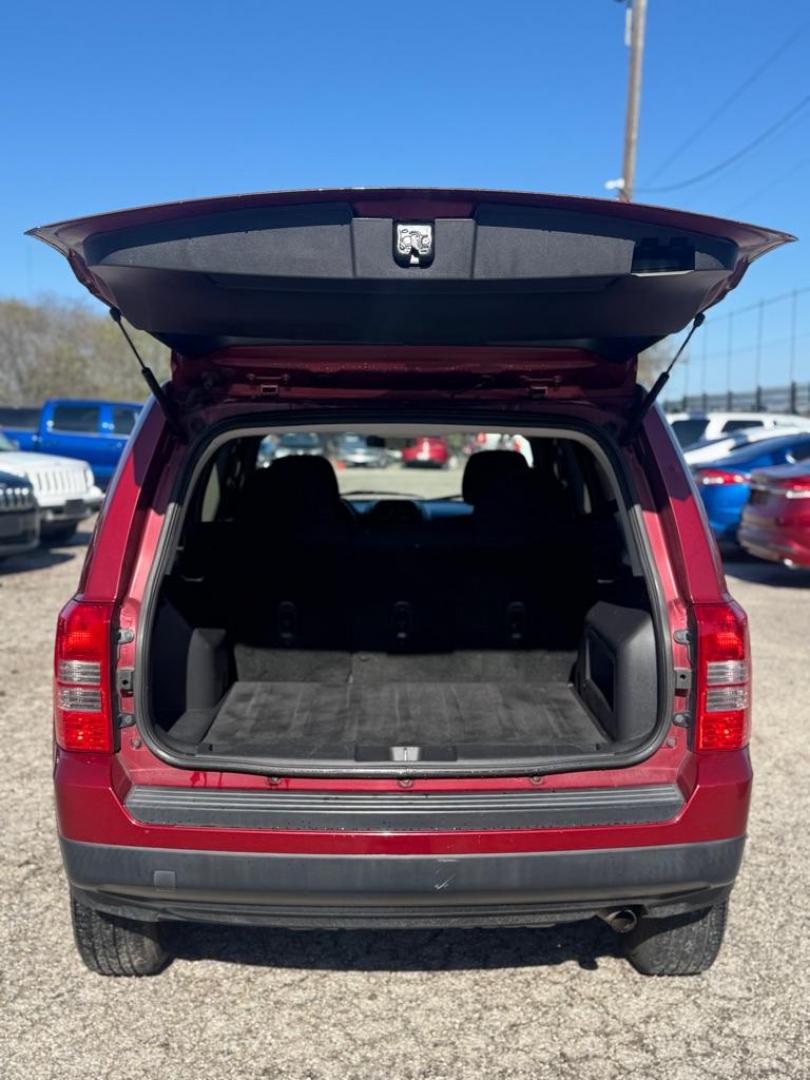 2014 RED JEEP PATRIOT SPORT (1C4NJRBBXED) with an 2.4L engine, Continuously Variable transmission, located at 1507 S Hwy 67, Cedar Hill, TX, 75104, (972) 293-1833, 32.556370, -96.973297 - Photo#4