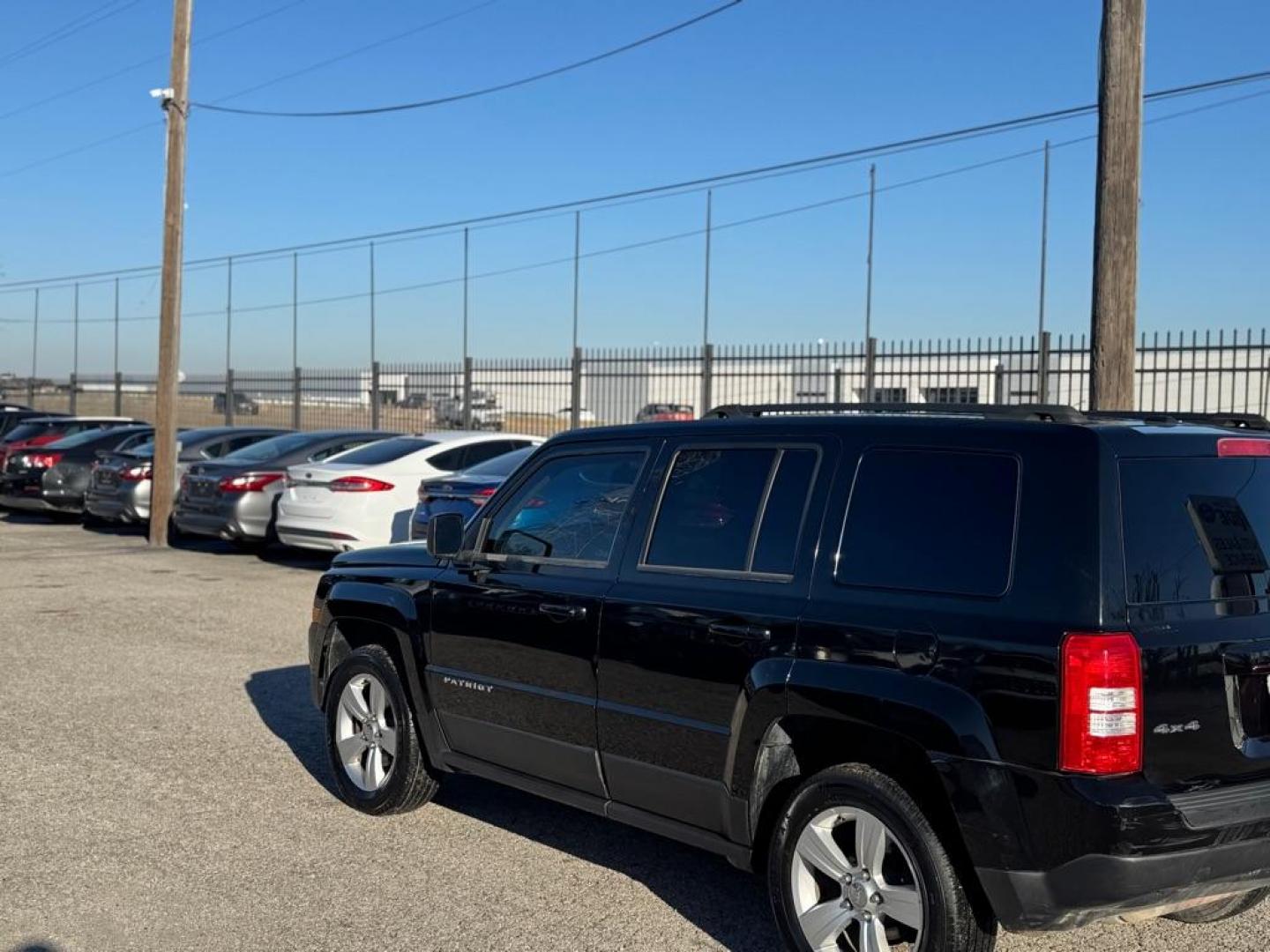 2014 BLACK JEEP PATRIOT LATITUDE (1C4NJRFB3ED) with an 2.4L engine, Continuously Variable transmission, located at 1507 S Hwy 67, Cedar Hill, TX, 75104, (972) 293-1833, 32.556370, -96.973297 - Photo#3