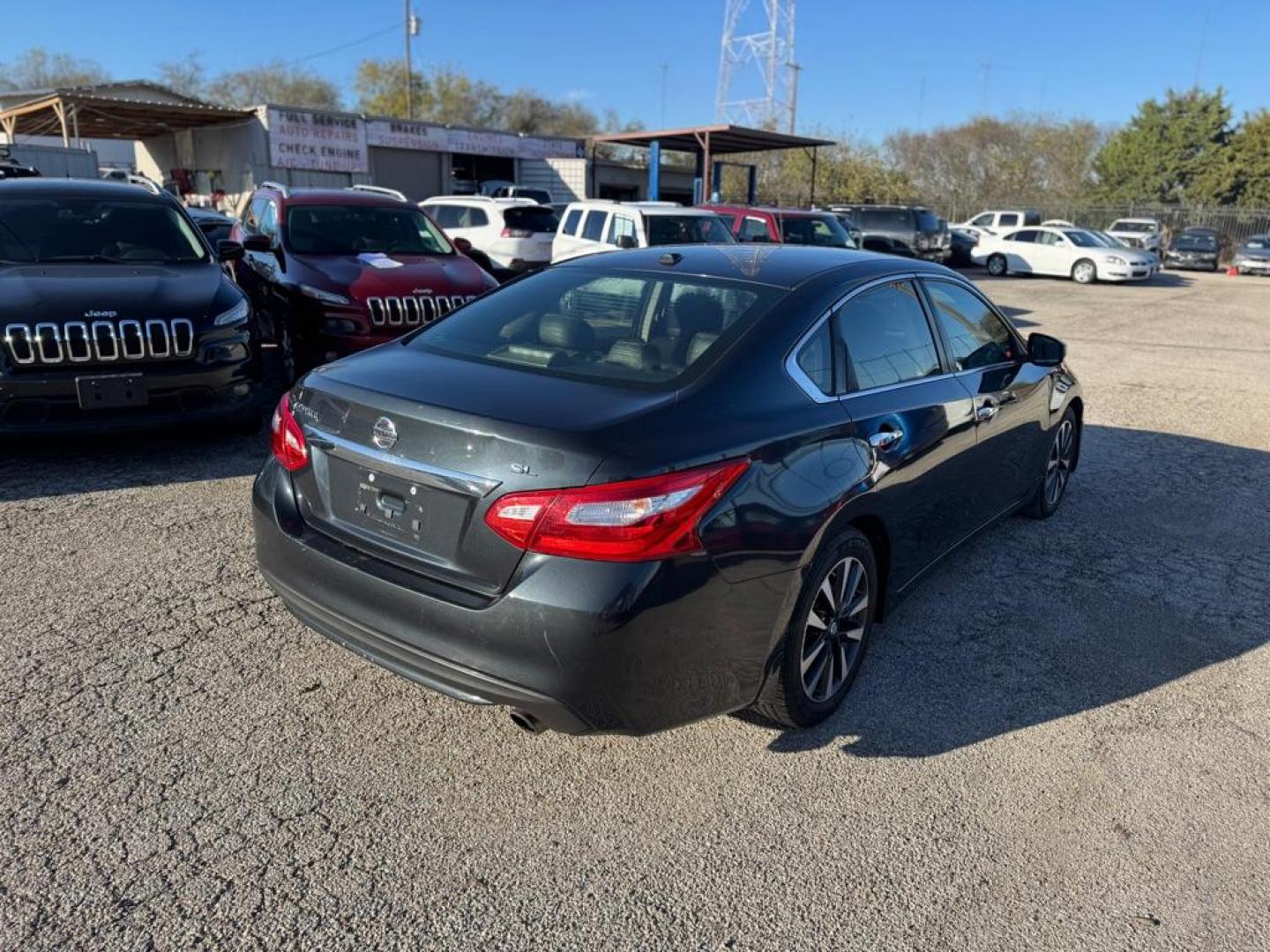 2016 BLUE NISSAN ALTIMA 2.5 (1N4AL3AP8GC) with an 2.5L engine, Continuously Variable transmission, located at 1507 S Hwy 67, Cedar Hill, TX, 75104, (972) 293-1833, 32.556370, -96.973297 - Photo#2