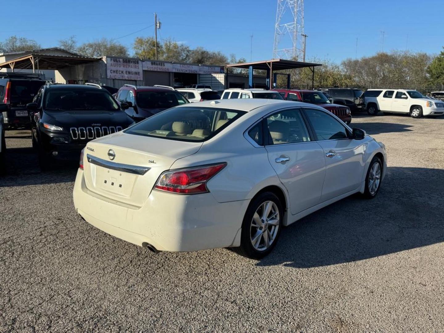 2015 WHITE NISSAN ALTIMA 2.5 (1N4AL3AP3FC) with an 2.5L engine, Continuously Variable transmission, located at 1507 S Hwy 67, Cedar Hill, TX, 75104, (972) 293-1833, 32.556370, -96.973297 - Photo#2