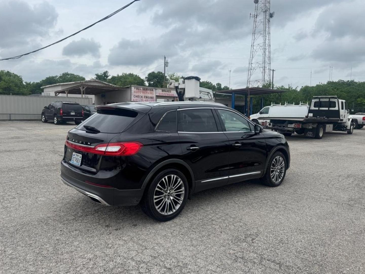2016 BLACK LINCOLN MKX RESERVE (2LMTJ6LRXGB) with an 3.7L engine, Automatic transmission, located at 1507 S Hwy 67, Cedar Hill, TX, 75104, (972) 293-1833, 32.556370, -96.973297 - Photo#2