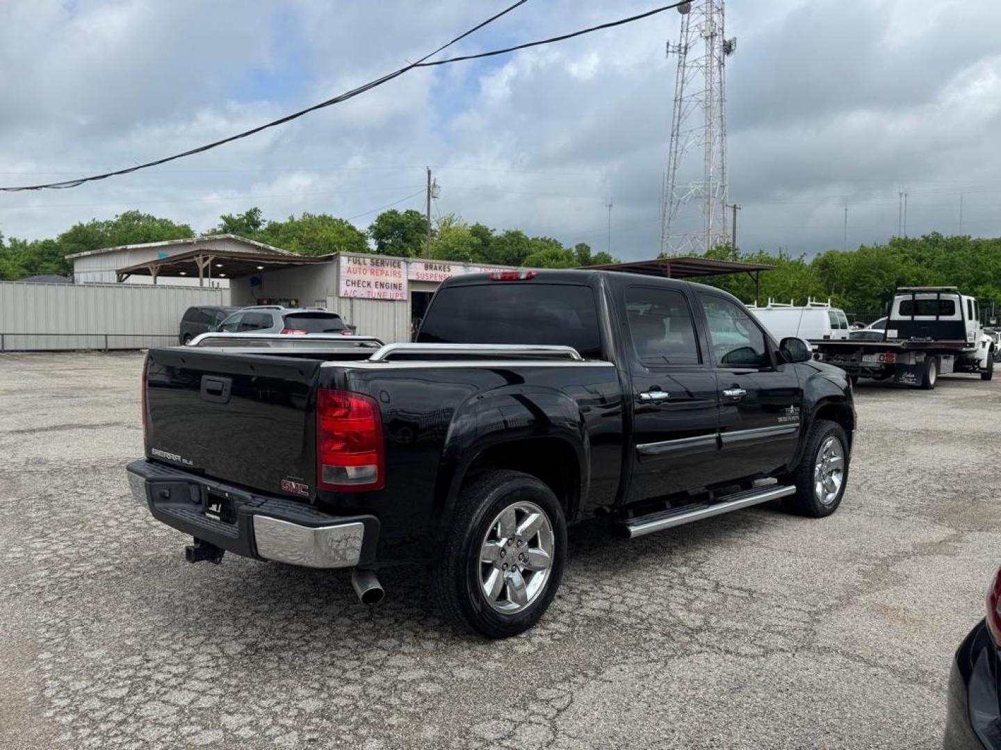 2013 BLACK GMC SIERRA 1500 SLE (3GTP1VE06DG) with an 5.3L engine, Automatic transmission, located at 1507 S Hwy 67, Cedar Hill, TX, 75104, (972) 293-1833, 32.556370, -96.973297 - Photo#2