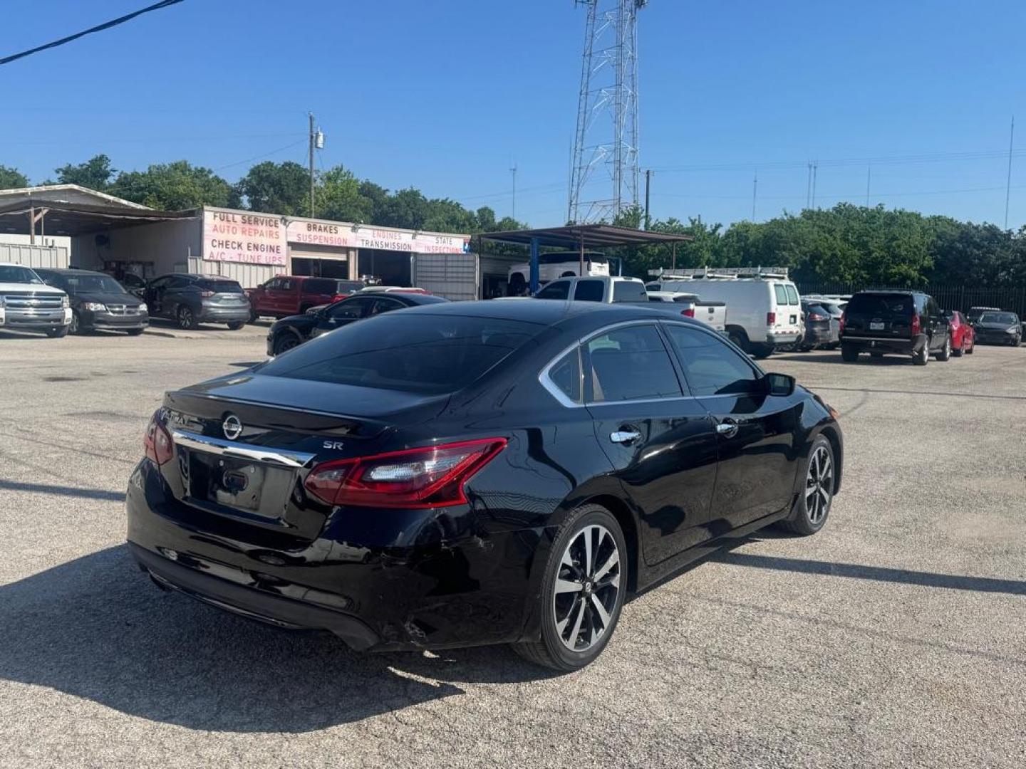 2018 BLACK NISSAN ALTIMA 2.5 (1N4AL3AP0JC) with an 2.5L engine, Continuously Variable transmission, located at 1507 S Hwy 67, Cedar Hill, TX, 75104, (972) 293-1833, 32.556370, -96.973297 - Photo#2