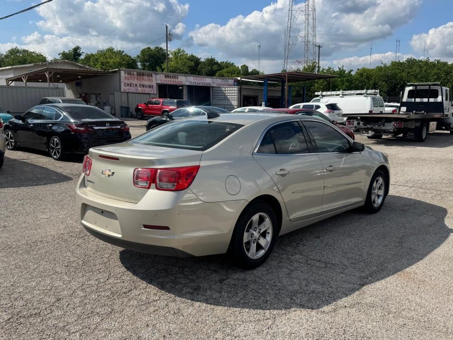 2016 GOLD CHEVROLET MALIBU LIMITED LS (1G11B5SA6GF) with an 2.5L engine, Automatic transmission, located at 1507 S Hwy 67, Cedar Hill, TX, 75104, (972) 293-1833, 32.556370, -96.973297 - Photo#2